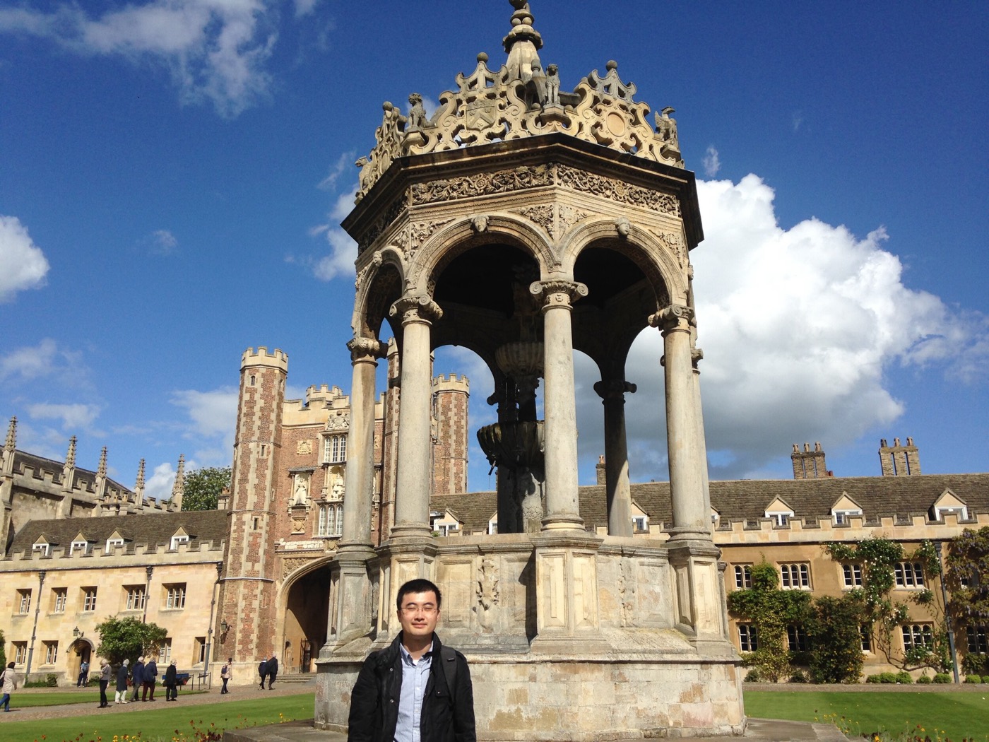 Rak-Kyeong Seong in front of the fountain in Great Court, Trinity College, Cambridge